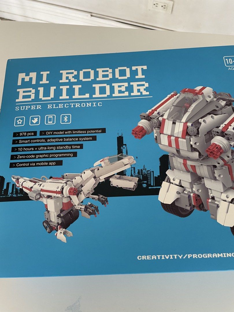 Mi Robot Builder (Category: Lego & Building Sets) located in Makati City. Submitted by gr8bargain (Listing ID 1437270962, Image 1). Description: The Mi Robot Builder is a versatile, self-balancing coding and construction toy by Xiaomi. Featuring roughly 1,000 LEGO-compatible ABS plastic pieces, the kit uses a 32-bit ARM processor, gyroscope, and brushless motors. Users build custom configurations (like robots, dinosaurs, or planes) and program th