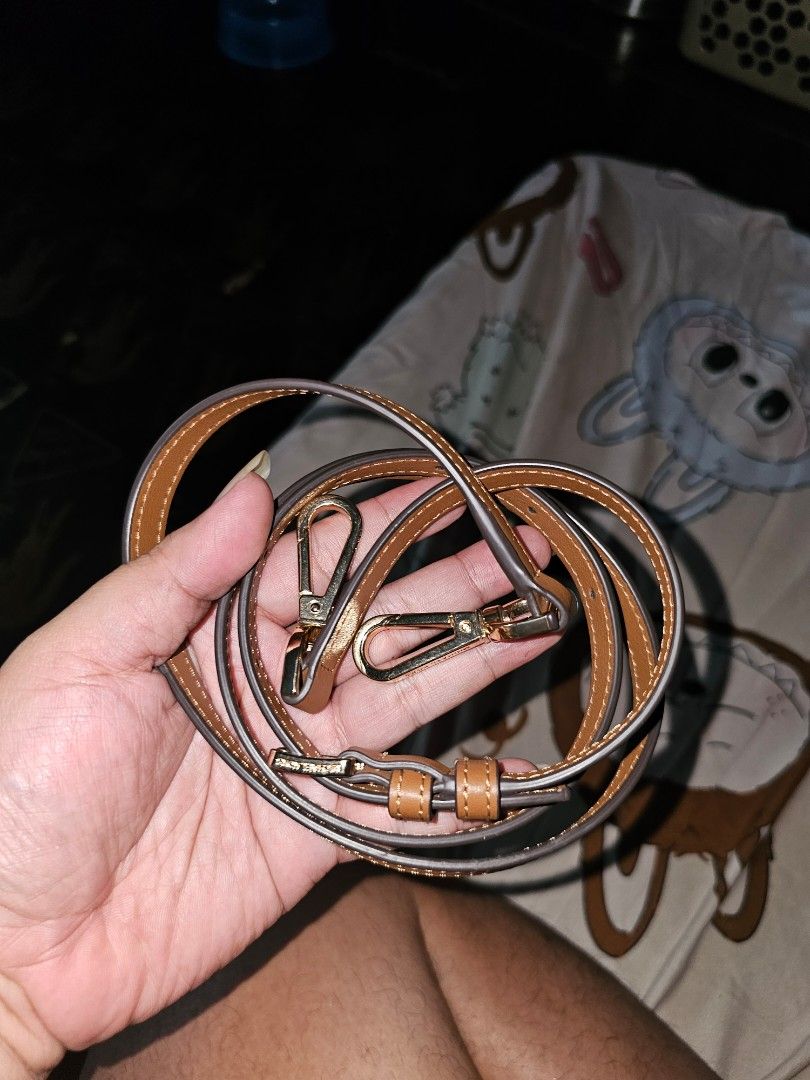 Michael Kors Tote Bag (Category: Luxury Bags & Wallets) located in Malabon City. Submitted by jhimilicious (Listing ID 1437220212, Image 3). Description: - Michael Kors tote bag - Brown monogram pattern - Tan leather accents - Top zipper closure - Interior pocket - Detachable shoulder strap - Gold-tone MK logo - Includes silica gel packet.