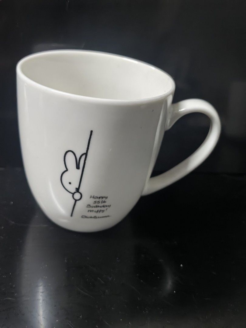 Miffy 65th Anniversary Mug (Category: Coffee & Tea Tableware) located in Rizal. Submitted by gkstcenit (Listing ID 1437297826, Image 1). Description: - Miffy design mug - Features a bunny outline and full Miffy illustration - Includes a handle and curved shape - Lawson collaboration - Approximately 4 inches tall.