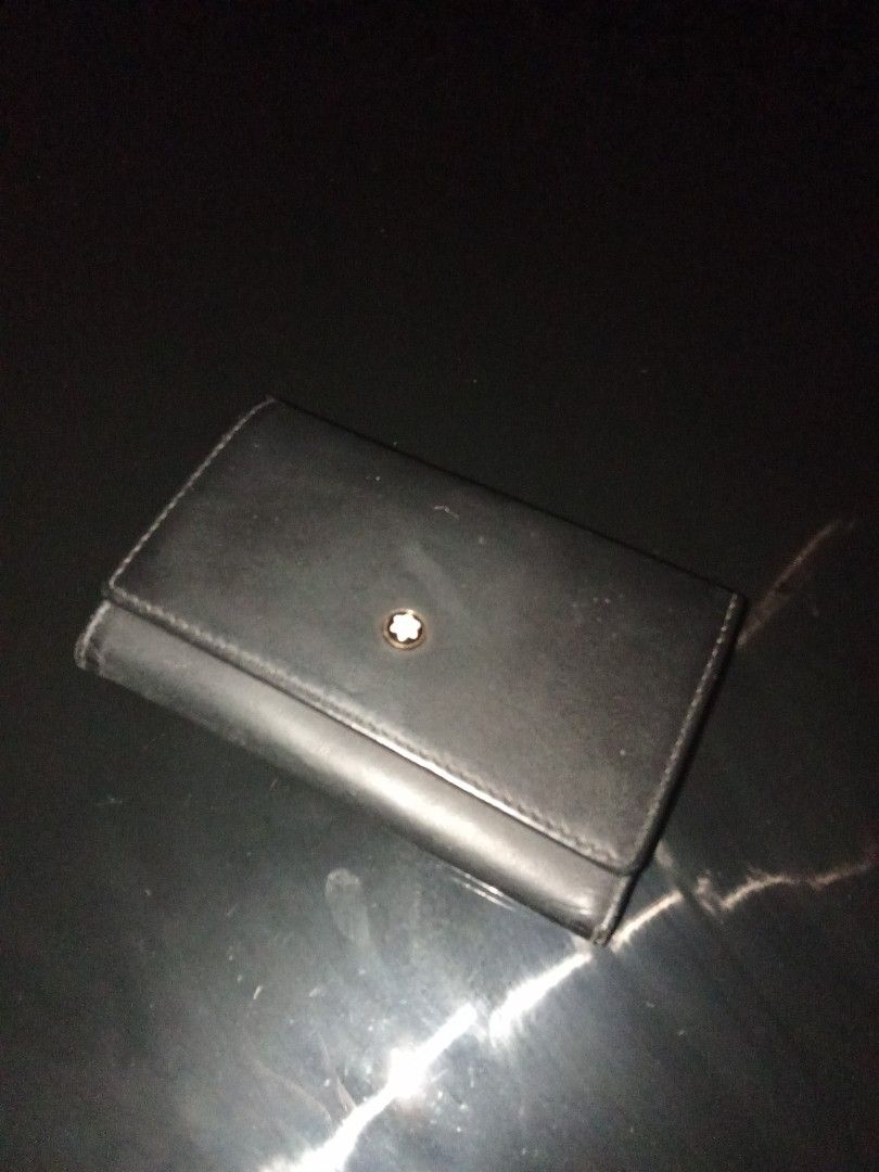 Montblanc Black Leather Key Holder Original (Category: Wallets & Card holders) located in Manila. Submitted by christoph17 (Listing ID 1437288488, Image 1). Description: - Genuine Montblanc key holder - Black leather - Snap closure - Key rings inside - Montblanc emblem on front - Gold-colored snap closure inside - Montblanc logo embossed inside.