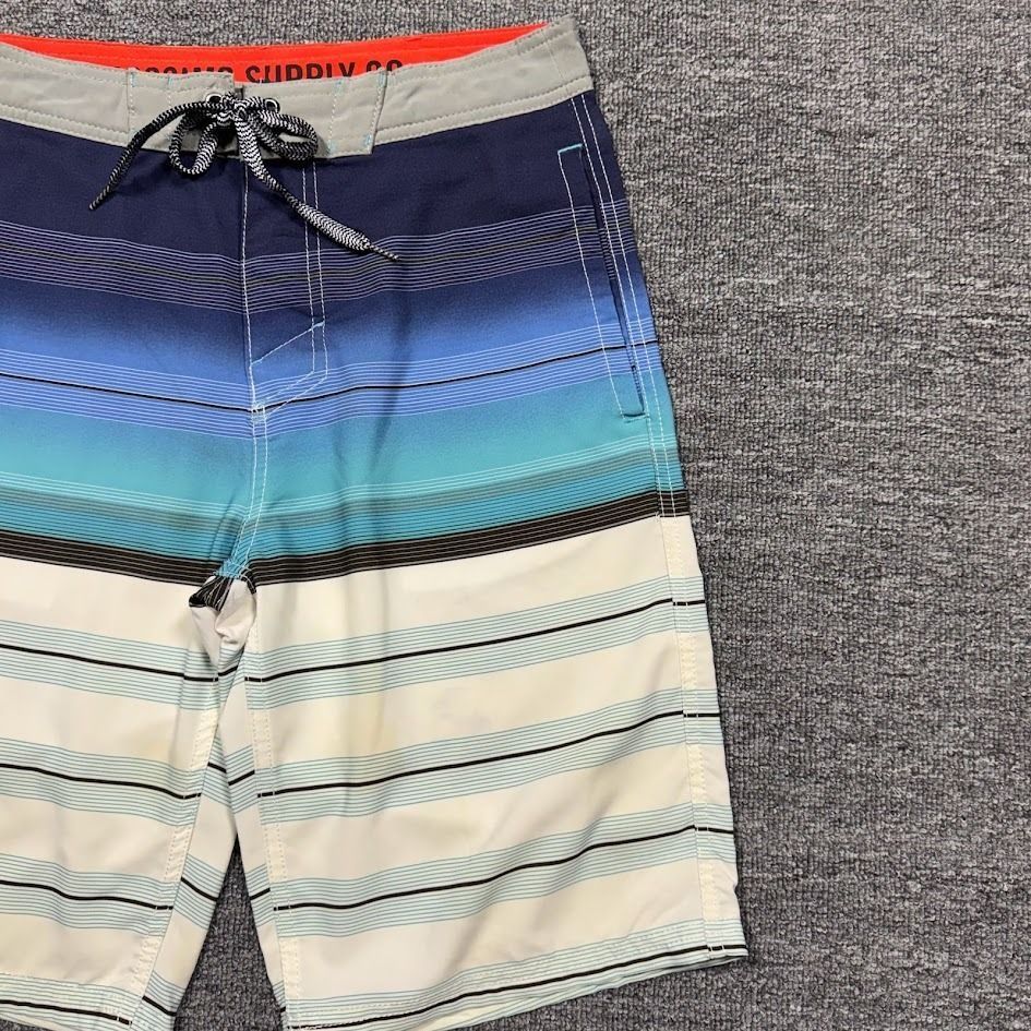 Mossimo Men's Gradient Striped Board Shorts (Category: Shorts) located in Daraga. Submitted by stylefitapparelph (Listing ID 1437366255, Image 3). Description: ✨Mossimo Men's Gradient Striped Board Shorts • SKU: 0094 • Condition: 9.8/10, authentic • Size on tag: Small • Waistline: 28–30” • Length: 21” • Leg Opening: 10” 💰 Bundle discounts available 📩 Message us for inquiries.