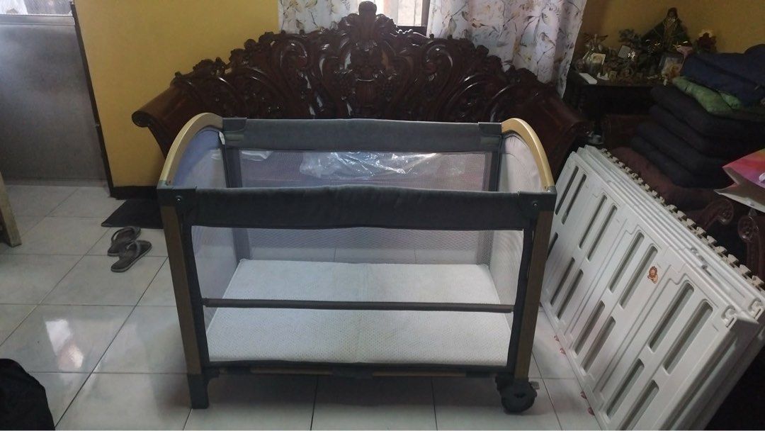 Multifunctional Bambina Portacrib (Category: Cots & Cribs) located in Manila. Submitted by kamekojiro (Listing ID 1437292625, Image 1). Description: Great for newborns up to 1 year old ✅ Diaper changer ✅ Co-sleeper ✅ Bassinet ✅ Crib/playpen Inclusions: 1 safety belt 1 mattress 1 diaper changer 1 porta crib Product size: Expanded size: 107.8 x 67 x 87 cm Folded size: 21 x 67 x 87 cm Co-sleeper height: 53.5 cm Mattress size: 24x42 inches May ilang 