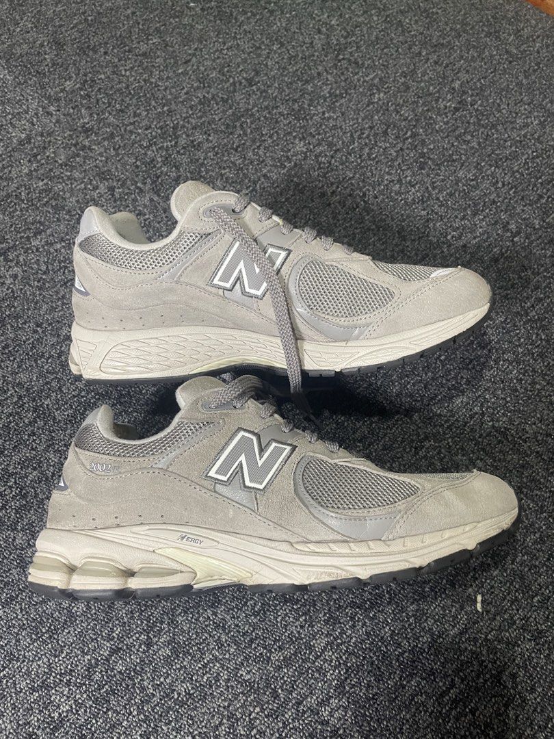 New Balance 2002R Grey Sneakers (Category: Sneakers) located in Cebu City. Submitted by lucky.finds.ph (Listing ID 1437214998, Image 1). Description: - New Balance 2002R - Grey colorway - Mesh and suede upper - Iconic 'N' logo - White and black sole - Grey laces - issue sign of usage.