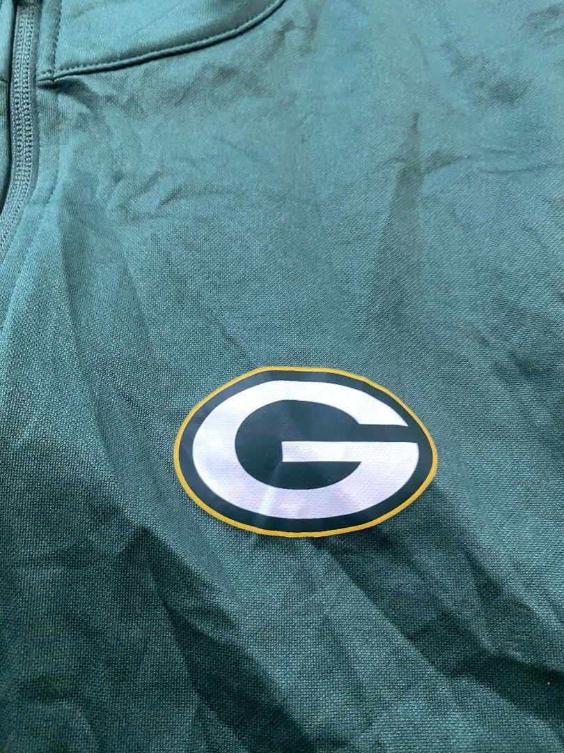 NFL Team G Packers Track Jacket ❗ (Category: Hoodies) located in Trinidad. Submitted by thrifter1997 (Listing ID 1437339641, Image 2). Description: Dimes: 22x27✅ Colorate:10/10✅ Condition:10/10✅ Issue: None❌ With hangtag pa ganda nito ❗.