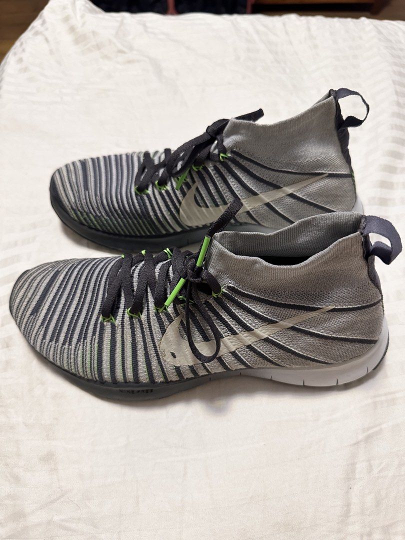 Nike Free RN Flyknit 2017 Sneakers (Category: Sneakers) located in Rodriguez. Submitted by harademetria (Listing ID 1437258174, Image 3). Description: - Nike Free RN Flyknit 2017 - Gray and black striped Flyknit upper - Sock-like collar - Black laces with green accents - White Nike swoosh - Black sole with white midsole and green accents - Soles show some wear.