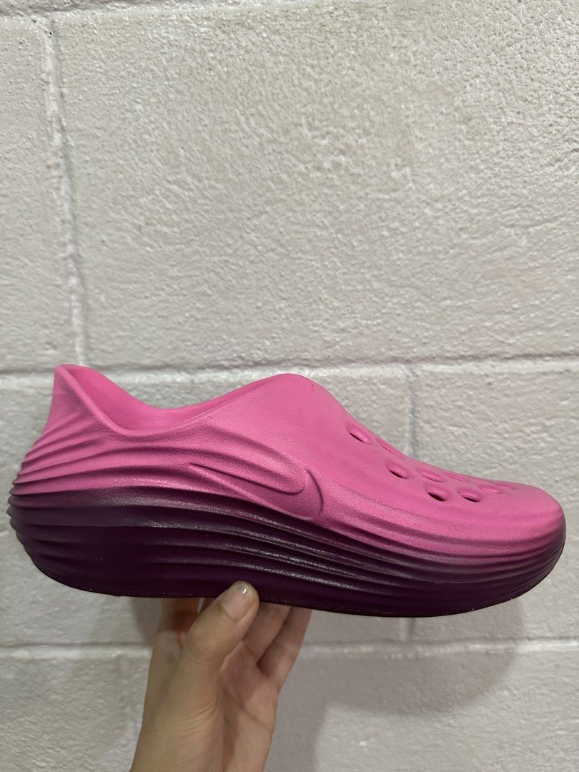 Nike ReactX Rejuven8 Slides (Category: Slippers and slides) located in Quezon City. Submitted by heyyjaaay (Listing ID 1437291841, Image 3). Description: Size: US WOMEN’s 6 / Men’s 5 Used twice, bought May 2026 RFS: sobrang sakto ng size; need to size up Will provide a nike box Will sanitize before shipping - Nike ReactX Rejuven8 Slides in Pink - Breathable design with multiple holes - Textured sole for grip - Sleek, modern look - Nike logo visib