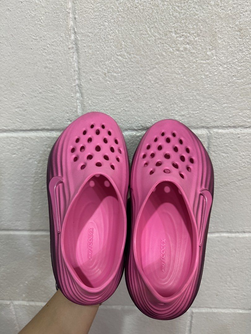 Nike ReactX Rejuven8 Slides (Category: Slippers and slides) located in Quezon City. Submitted by heyyjaaay (Listing ID 1437291841, Image 2). Description: Size: US WOMEN’s 6 / Men’s 5 Used twice, bought May 2026 RFS: sobrang sakto ng size; need to size up Will provide a nike box Will sanitize before shipping - Nike ReactX Rejuven8 Slides in Pink - Breathable design with multiple holes - Textured sole for grip - Sleek, modern look - Nike logo visib