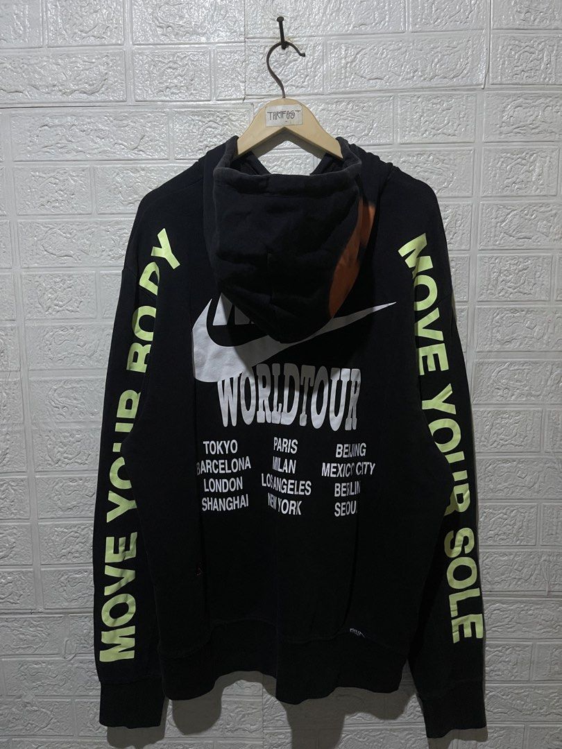 Nike World Tour Hoodie (Category: Hoodies) located in Quezon City. Submitted by davidso682 (Listing ID 1437360414, Image 3). Description: - Black Nike World Tour hoodie - Features Nike logo and "World Tour" text on front and back - Sleeves printed with "Move Your Body" and "Move Your Sole" - Double Nike logo on the hood - Made in Pakistan Length 30 Width 24 .