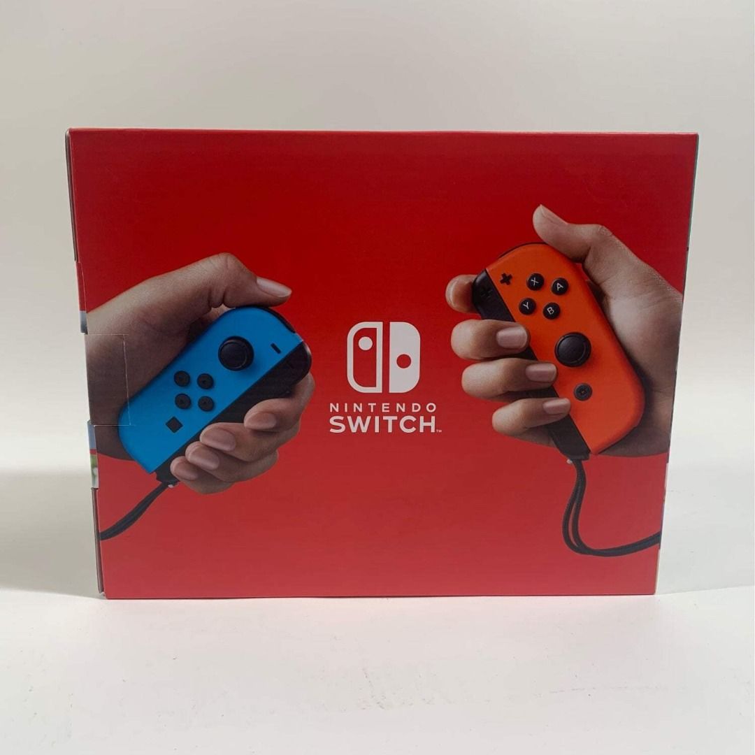 Nintendo Switch Console (Category: Nintendo) located in Manila. Submitted by silentstar_8bf65d (Listing ID 1437372888, Image 3). Description: - Nintendo Switch console - Comes with blue and red Joy-Con controllers - Includes all necessary accessories - Ready to play out of the box! - Versatile console for different gaming configurations.