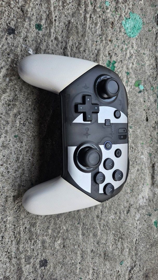 Nintendo Switch Pro Controller (Category: Controllers) located in Manila. Submitted by stephgrmnt (Listing ID 1437235892, Image 1). Description: Smash Bro Edition Original Rarely used Comes with the original cable RFS: Hindi na nagagamit.
