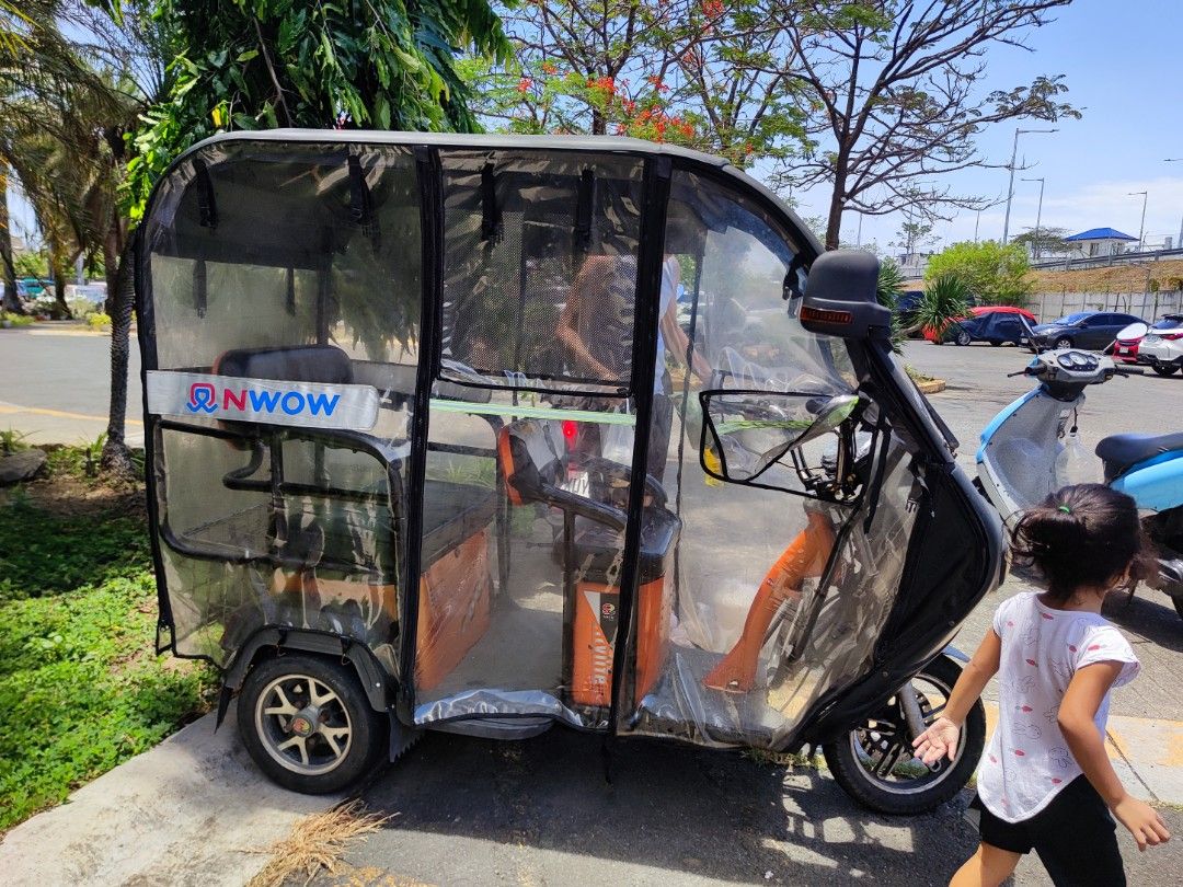 NWOW 3-Wheel E-bike (Category: Everything Else Others) located in Paranaque City. Submitted by roxanne.vds (Listing ID 1437255696, Image 2). Description: - used for more than 4 years - selling low due to visible signs of repair - Good battery life,kapapalit lng 2 years ago Issues - natatangal na ung wiper - seat covers are scraped-off na - 1 headlight is not working - ceiling has sealant due to some cracks.