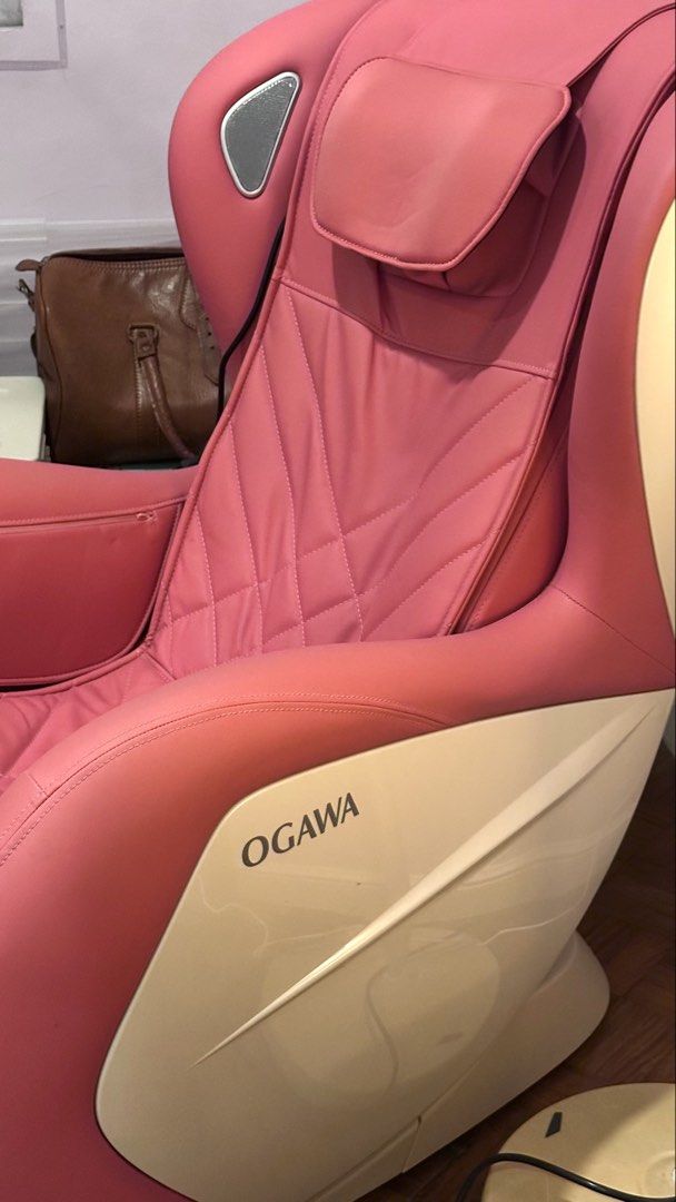 Ogawa My Sofa 2 Massage Chair (Category: Chairs) located in Las Pinas. Submitted by meyhaaa (Listing ID 1437369897, Image 2). Description: Bought for 199k Bnew now costs around 139k but no stock online Ogawa My Sofa 2 massage chair features airbag massage, zero wall design, and zero gravity. It has multiple massage settings and a control panel. The chair is pink with white accents and includes speakers. .