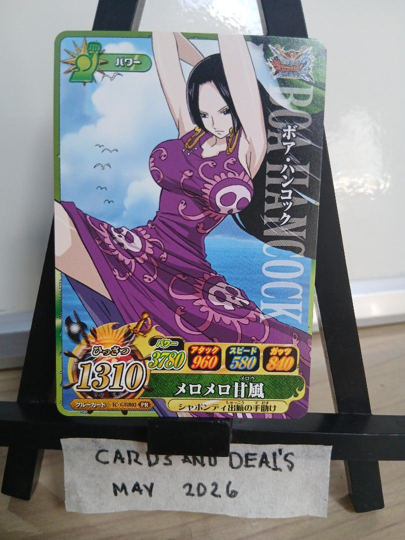 One Piece Card Game - Boa Hancock (Category: Raw Singles) located in Davao. Submitted by noelstuffedhub (Listing ID 1437218785, Image 1). Description: One Piece card featuring Boa Hancock. The card has Japanese text and a power level of 1310. The card has a purple dress and a background of the sea. The card is from the One Piece card game..