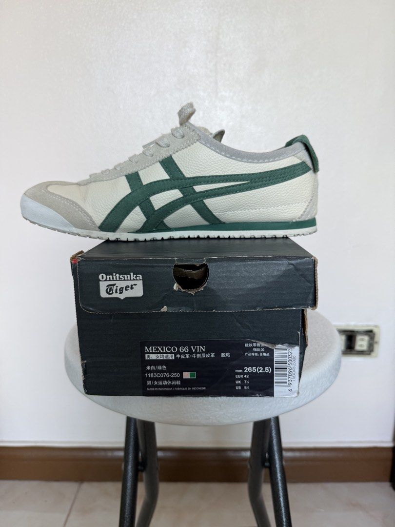 Onitsuka Tiger Mexico 66 VIN Sneakers (Category: Sneakers) located in Manila. Submitted by maag16 (Listing ID 1437220433, Image 1). Description: - Onitsuka Tiger Mexico 66 VIN - Color: Cream and Green - Size: 265 (US 8.5), EUR 42 - Includes: Original box and tags - Made in Indonesia - Features iconic tiger stripes - Classic design - Box condition: Shows wear and tear.