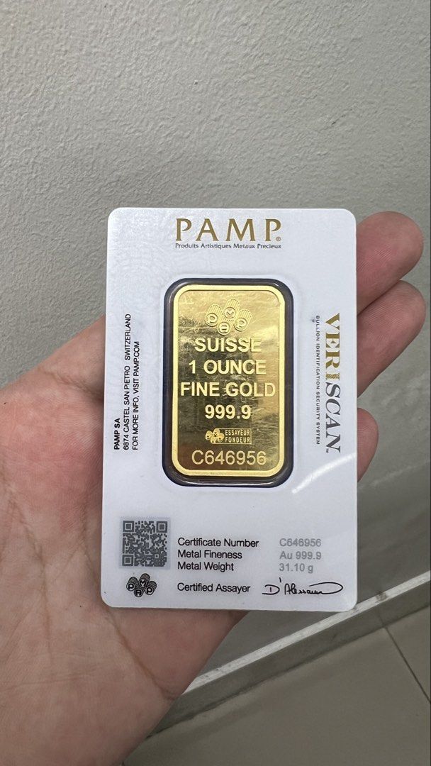 PAMP Suisse 1 Ounce Fine Gold Bar (Category: Currency) located in Quezon City. Submitted by goodstuffsssssph (Listing ID 1437247663, Image 2). Description: Genuine PAMP Suisse 1 ounce fine gold bar. Features a beautiful design and is made in Switzerland. The bar has a metal fineness of Au 999.9 and weighs 31.10g. Includes a certificate number C646956. The bar is sealed in its original packaging..