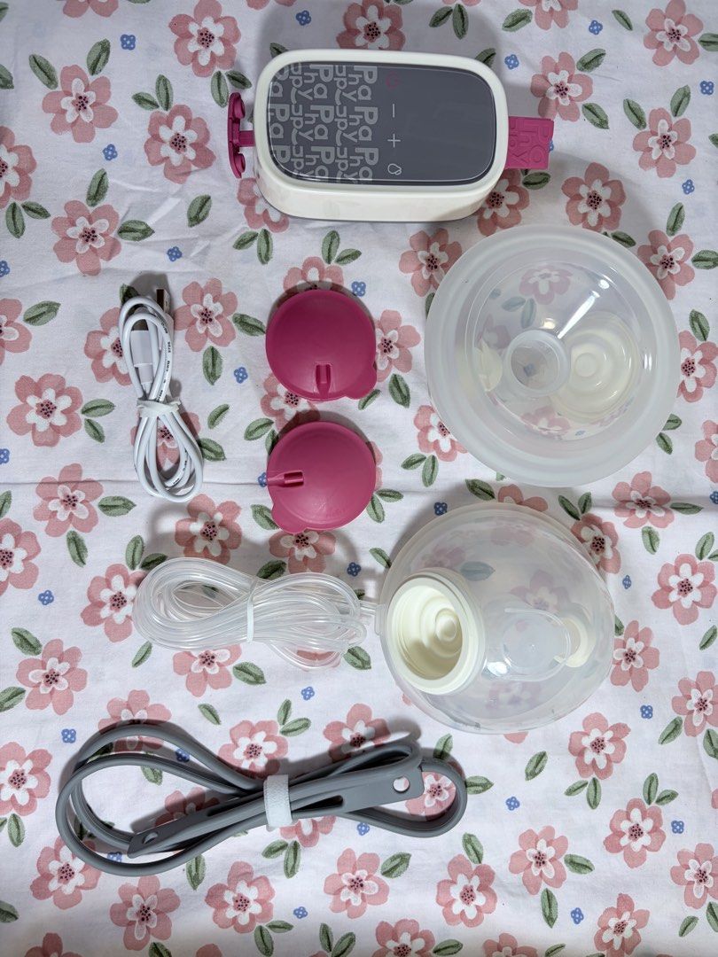 Phanpy Rosy Breast Pump Complete Set (Category: Breastfeeding & Bottle Feeding) located in Manila. Submitted by marydarlen03227 (Listing ID 1437360385, Image 2). Description: - Pre-loved Phanpy Rosy breast pump - Complete set: pump motor, diaphragms, breast shield set, tubing, USB cable, and strap - Perfect for Maarte moms! - Comfortable, pain-free soft suction - Gentle pumping experience - Easy to assemble and clean - BPA-free materials.