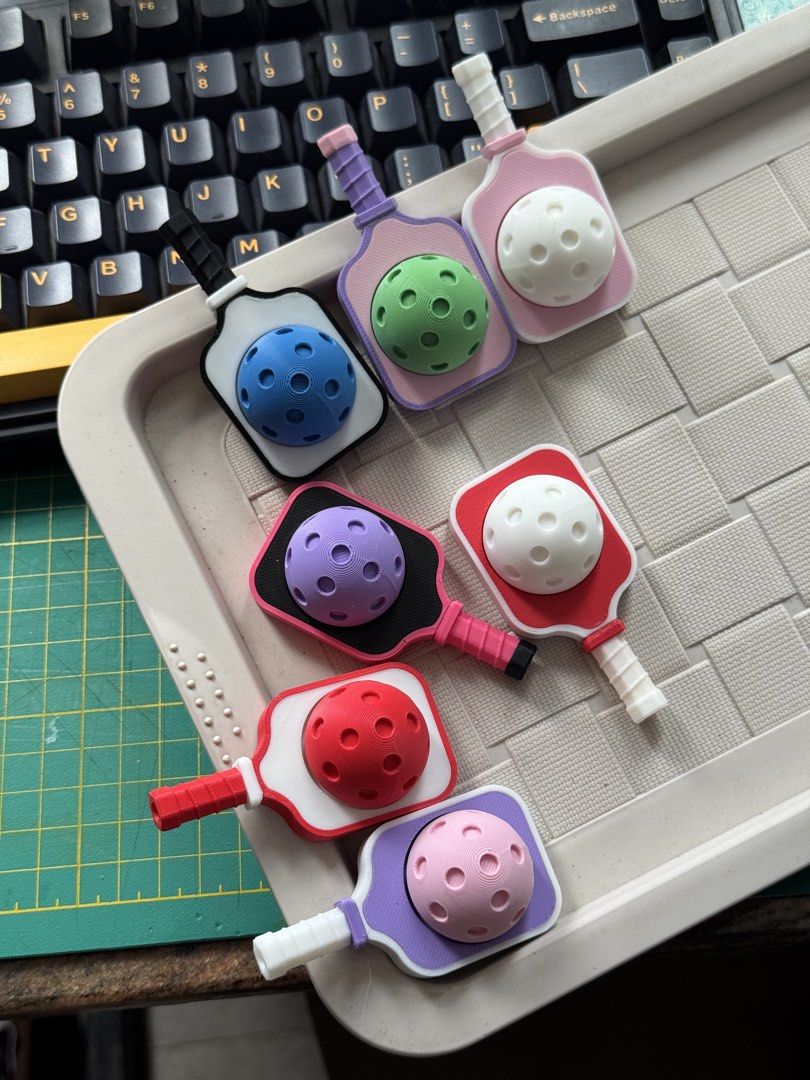 Pickleball clickers (Category: Character Goods) located in Quezon City. Submitted by catpurrent (Listing ID 1436347591, Image 1). Description: Hi! We’re selling pickleball clickers. Colors can be customized. #fidget #keychains .