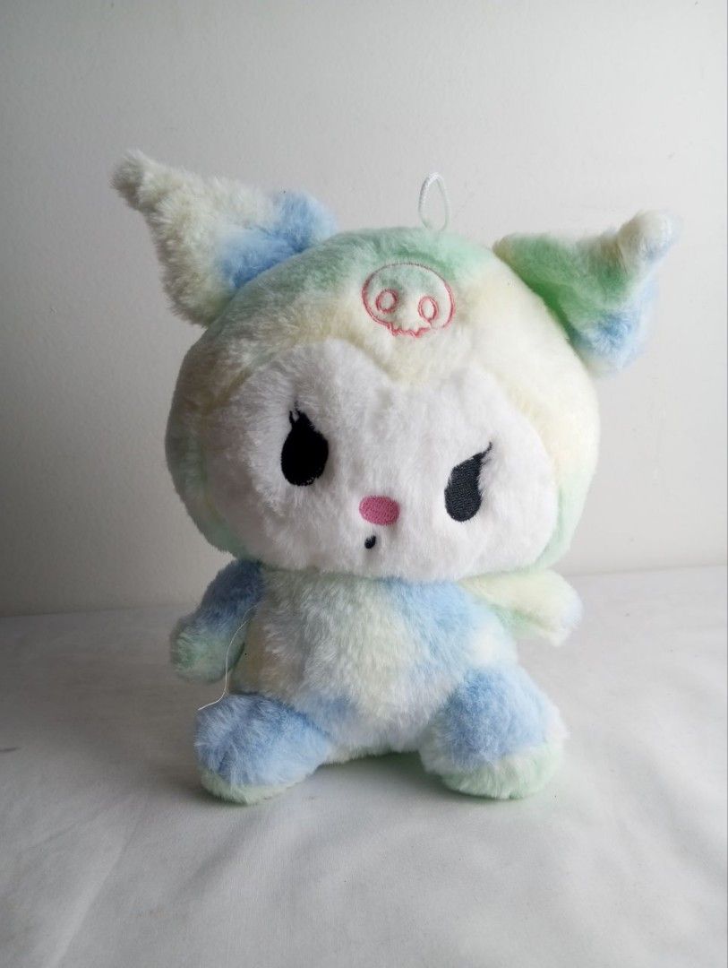 Piggy Kuromi Plush Toy (Category: Plushies & Soft Toys) located in Baguio. Submitted by mclilospantry (Listing ID 1437227359, Image 1). Description: - Adorable Kuromi plush toy - Unique piggy design - Pastel tie-dye pattern (blue, green, white) - Features black eyes and pink nose - Includes a small pig snout - Has a loop for hanging - Great for collectors or gifts.