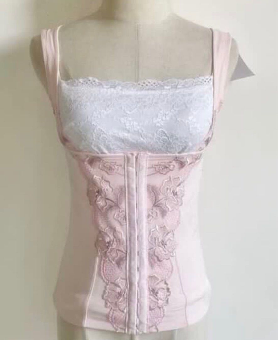 Pink Floral Embroidered Corset (Category: Others Tops) located in Consolacion. Submitted by fadedruby (Listing ID 1437234168, Image 1). Description: - fits xs-s - has a tiny stain but it’s not that noticeable - pictures are from the original seller (except for the stain photo since they didn’t notice it beforehand) - bought this on carousell but i’ve never worn it rfs: it’s a bit longer on me than i expected and unflattering for my body type 🥲 m