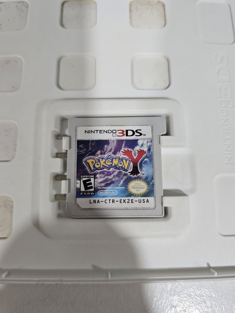 Pokemon Y Nintendo 3DS Games (Category: Nintendo) located in San Fernando. Submitted by dinochen921 (Listing ID 1437367667, Image 3). Description: - Pokemon Y for Nintendo 3DS - Php 1,499 - Tested and working - Includes game cartridge and original case and manuals - Shows some wear on the case and cover but does not affect the game.