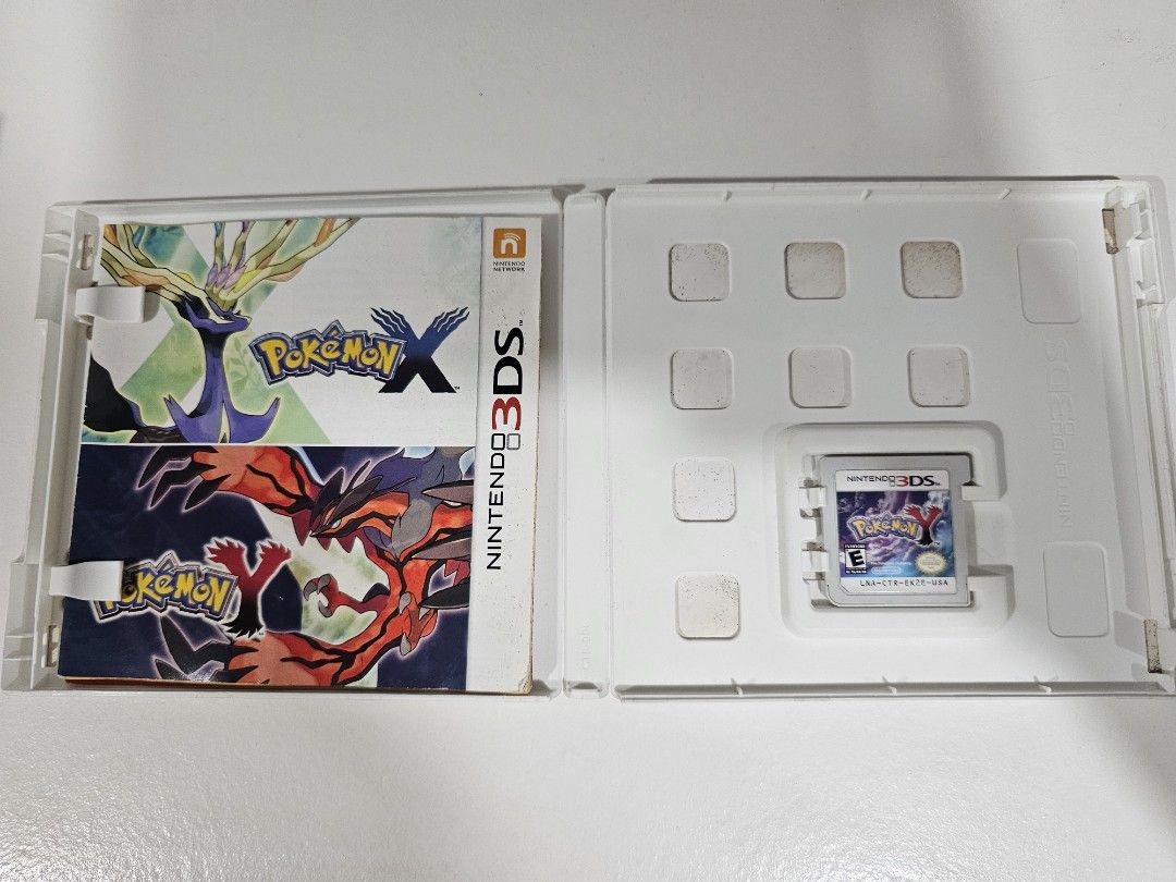 Pokemon Y Nintendo 3DS Games (Category: Nintendo) located in San Fernando. Submitted by dinochen921 (Listing ID 1437367667, Image 2). Description: - Pokemon Y for Nintendo 3DS - Php 1,499 - Tested and working - Includes game cartridge and original case and manuals - Shows some wear on the case and cover but does not affect the game.