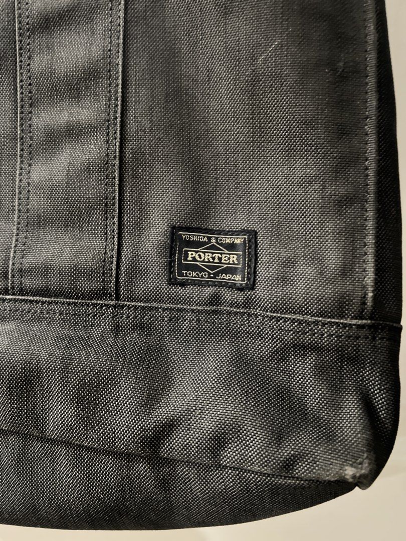 Porter Tokyo Grey Denim Tote Bag (Category: Tote Bags) located in Paranaque City. Submitted by btslite (Listing ID 1437382685, Image 2). Description: - Dimension (16x13 inches) - Made from durable, dark grey fabric - Features multiple interior pockets for organization - Sturdy handles for comfortable carrying - Rectangular shape ⚠️ Condition: Pre-loved / second-hand. Not brand new—may have minimal signs of use. 📍 Location: Parañaque City (near S
