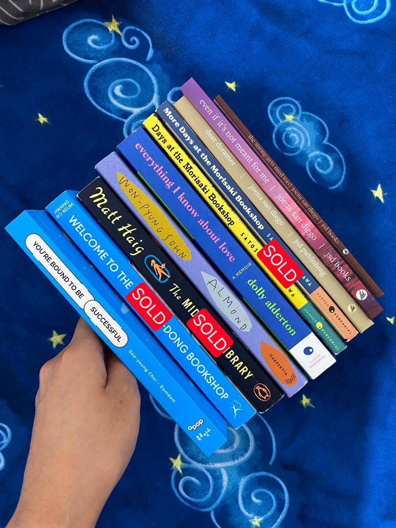 [Pre-loved] Assorted Fantasy, Fiction Books (Category: Storybooks) located in Meycauayan. Submitted by shescelsshesells (Listing ID 1437031809, Image 1). Description: Selling my PRE-LOVED FANTASY, FICTION BOOKS. Mix books from Korean, Japanese, and Filipino authors. Satoshi Yagisawa, Joena San Diego, Dolly Alderton, Won Pyung Sohn, Seo-young Choi, Matt Haig, Hwang Bo-Reum BOOKS AVAILABLE: • The Midnight Library • You're bound to be Successful • A
