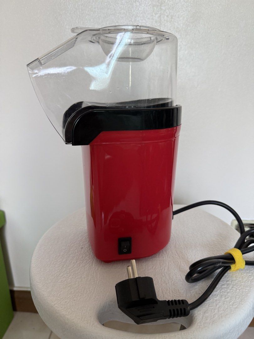 RAF Popcorn Machine R-9614 (Category: Fryers) located in Manila. Submitted by maag16 (Listing ID 1437220991, Image 2). Description: - RAF popcorn machine (Model R-9614) in red - Clear top and black power switch - Rubber feet on the base - Voltage: 220-240V, 50/60Hz - Philippine-style plug.
