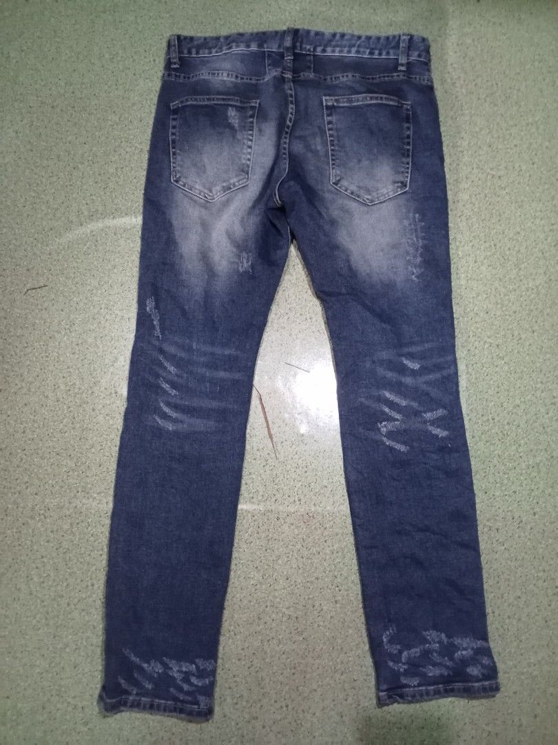 Saint Laurent tattered jeans slimfit (Category: Luxury Apparel) located in Manila. Submitted by philippepe58104 (Listing ID 1437396559, Image 2). Description: Saint Laurent tattered jeans size W34to35L39 slimfit pm.