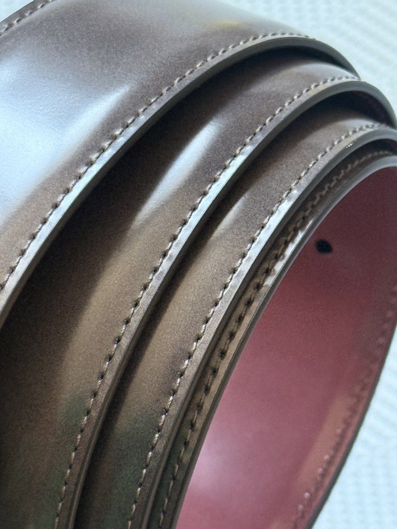 Salvatore Ferragamo Reversible Belt (Category: Belts) located in Cebu City. Submitted by frime (Listing ID 1437250398, Image 2). Description: Authentic Salvatore Ferragamo belt Reversible: Charcoal Grey and burgundy Includes original box and dust bag /tag Glossy leather finish Silver-tone Gancini buckle Size: 115 (measured actual around 48 inches end to end) .