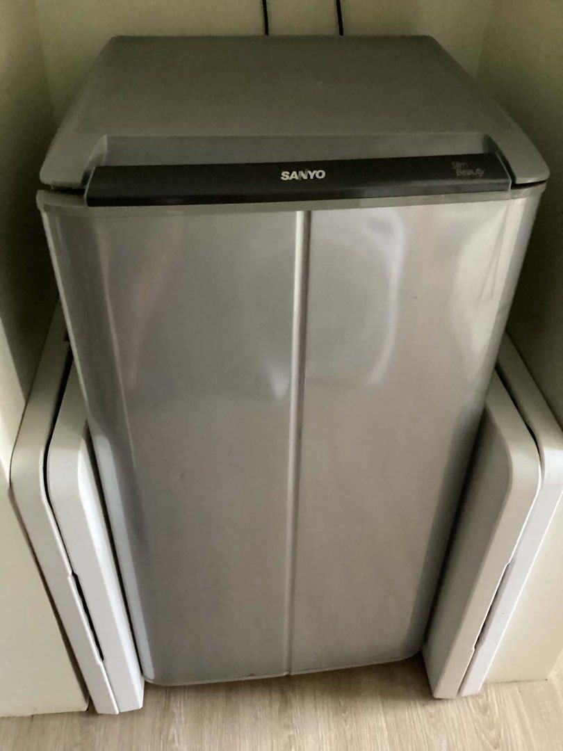 Sanyo Slim Beauty Refrigerator (Category: Refrigerators and Freezers) located in Pasig City. Submitted by sellthings99 (Listing ID 1437288902, Image 1). Description: - Sanyo Slim Beauty refrigerator - Sleek silver design - Top handle - Compact and space-saving - Ready for use - Ideal for small spaces.
