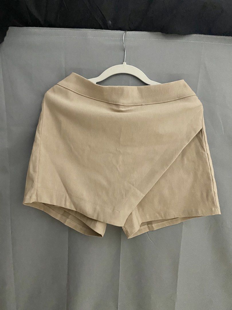 Skort (Category: Other Bottoms) located in Manila. Submitted by mxnkye (Listing ID 1437324355, Image 1). Description: Beige Skort — STRETCHABLE Free Size.