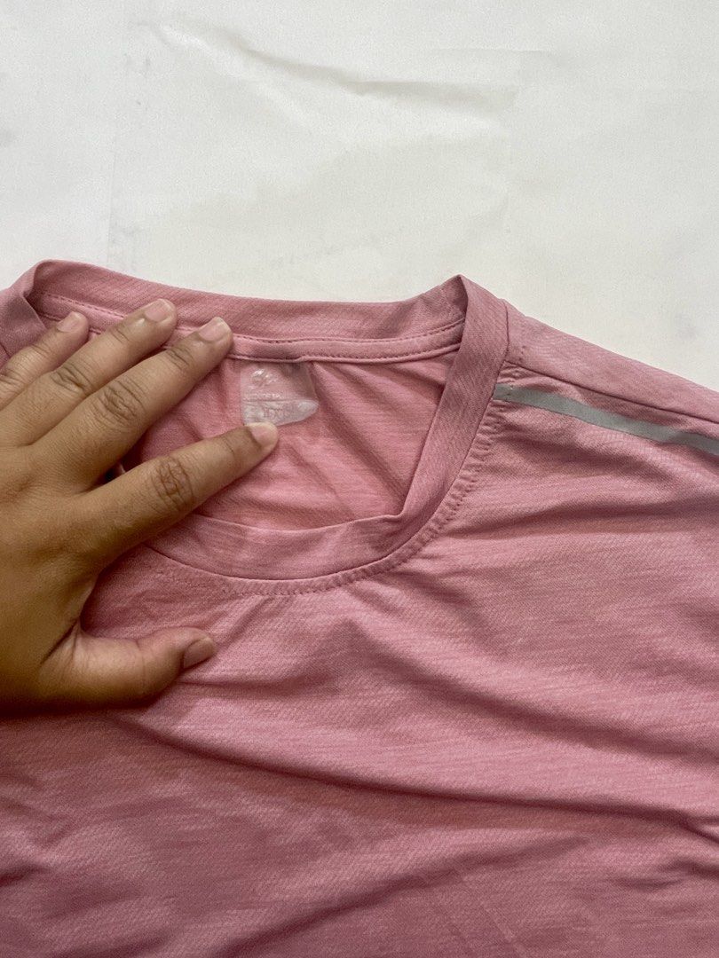 Sportswear Pink Shirt (Category: Shirts) located in Manila. Submitted by pepperstoremerch (Listing ID 1437375402, Image 3). Description: Sportswear Pink Shirt Top For Exercise/Gym Size Large Polyester Preloved, good condition Please see pictures D0049.