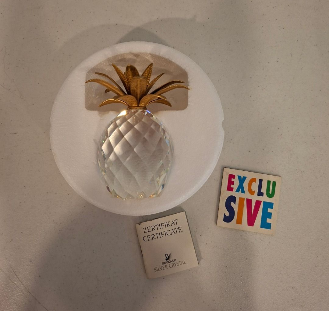 Swarovski Silver Crystal Pineapple Figurine (Category: Other Home Decor) located in Quezon City. Submitted by xfiremaxx (Listing ID 1437224484, Image 3). Description: Timog Morato. Office hours. - Swarovski Silver Crystal pineapple - Art 7507 NR 105 001 Large Pineapple with goldtone leaf top. Vintage & retired. Height 4.125" - Comes with original box and certificate PHP7,900.00 or best offer .