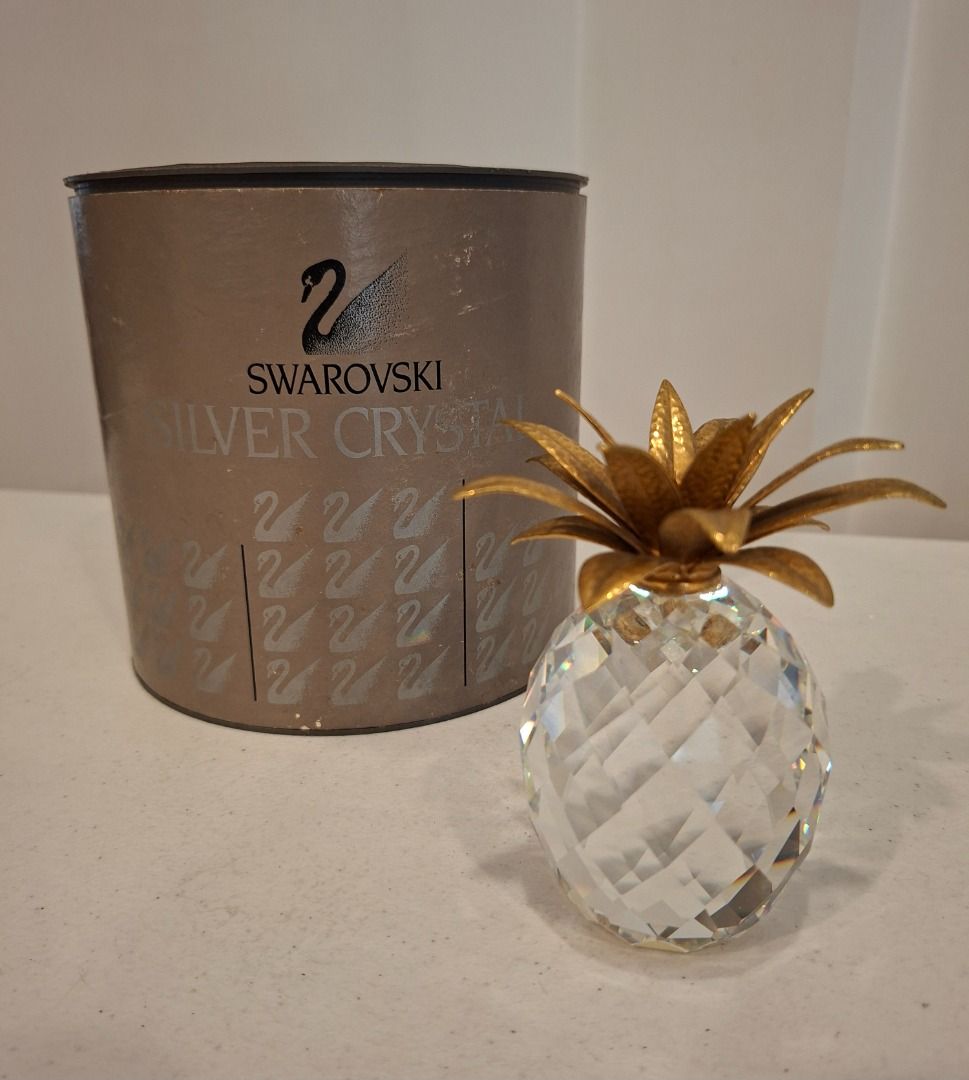 Swarovski Silver Crystal Pineapple Figurine (Category: Other Home Decor) located in Quezon City. Submitted by xfiremaxx (Listing ID 1437224484, Image 1). Description: Timog Morato. Office hours. - Swarovski Silver Crystal pineapple - Art 7507 NR 105 001 Large Pineapple with goldtone leaf top. Vintage & retired. Height 4.125" - Comes with original box and certificate PHP7,900.00 or best offer .