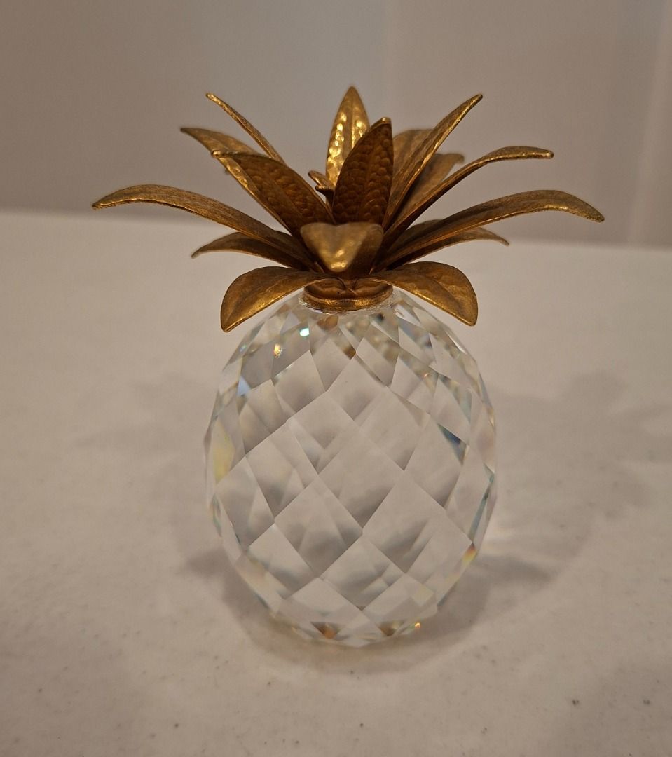 Swarovski Silver Crystal Pineapple Figurine (Category: Other Home Decor) located in Quezon City. Submitted by xfiremaxx (Listing ID 1437224484, Image 2). Description: Timog Morato. Office hours. - Swarovski Silver Crystal pineapple - Art 7507 NR 105 001 Large Pineapple with goldtone leaf top. Vintage & retired. Height 4.125" - Comes with original box and certificate PHP7,900.00 or best offer .