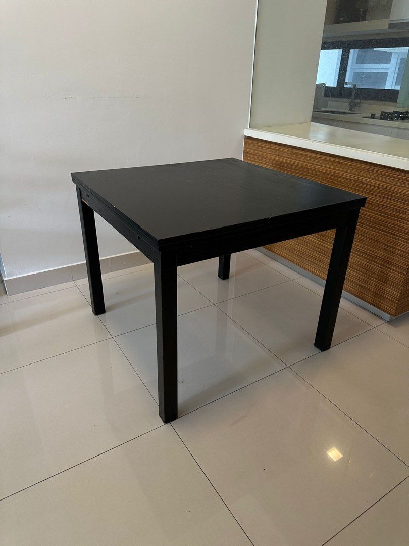 Table (Category: Tables & Sets) located in Singapore. Submitted by jojomario28 (Listing ID 1437294441, Image 3). Description: Black Dining Table for Sale 🖤 Minimalist black dining table in good condition. Clean and sturdy design that fits well in modern homes, condos, or small apartments. ✅ Strong and stable ✅ Sleek black finish ✅ Suitable for dining or workspace use ✅ Well maintained Selling as I’m clearing space/moving house. Self-collect pref