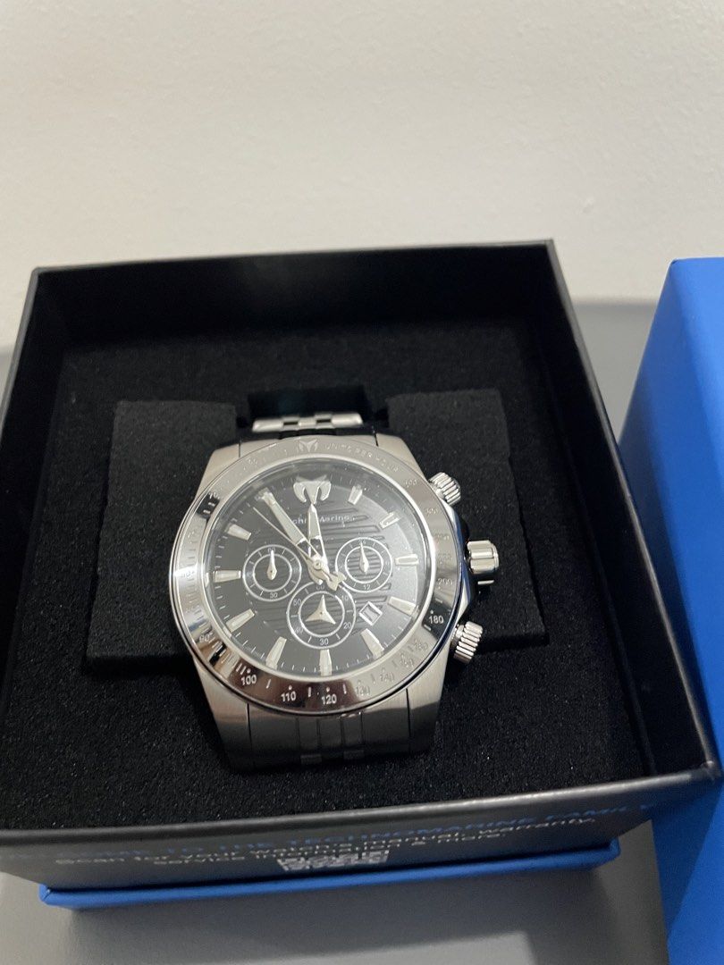 TechnoMarine TM-220142 Manta Ray Chronograph Watch (Category: Men's Watches) located in Marikina City. Submitted by thejason (Listing ID 1437376084, Image 2). Description: - TechnoMarine chronograph watch - Black dial - Silver-tone stainless steel bracelet - Features three sub-dials - Date display - Rotating bezel - Comes with original box - Model: TM-220142 - Serial: 10723.