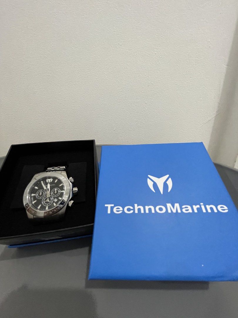 TechnoMarine TM-220142 Manta Ray Chronograph Watch (Category: Men's Watches) located in Marikina City. Submitted by thejason (Listing ID 1437376084, Image 3). Description: - TechnoMarine chronograph watch - Black dial - Silver-tone stainless steel bracelet - Features three sub-dials - Date display - Rotating bezel - Comes with original box - Model: TM-220142 - Serial: 10723.
