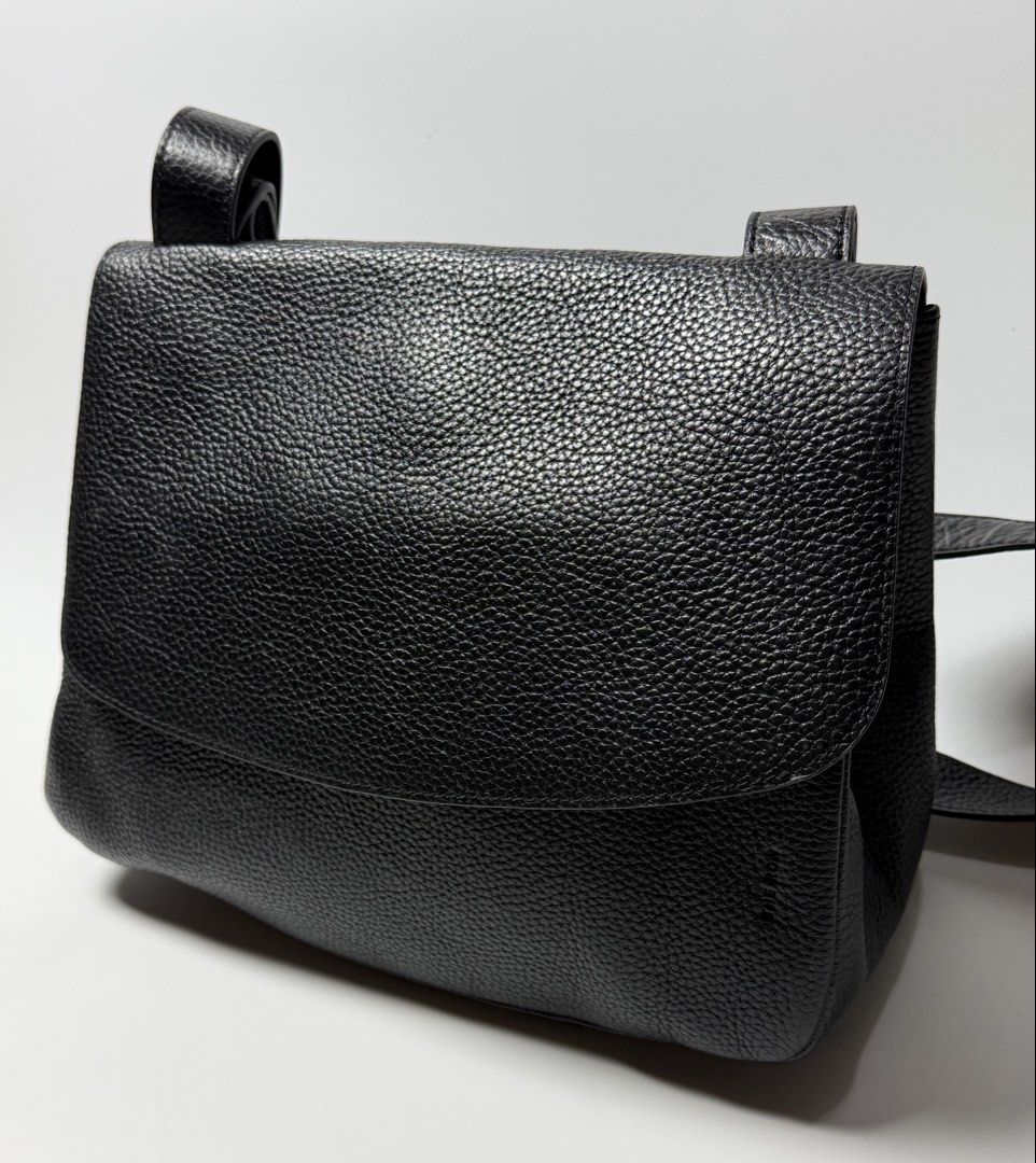 The row - Leather mail crossbody bag (Category: Cross-body Bags) located in Tarlac. Submitted by random.stufff (Listing ID 1437288732, Image 3). Description: The row leather mail crossbody bag Width: 11 inches Height: 10 inches Issue: re-stitched on both sling ends, pls see photos to appreciate. ₱5,000 free shipping Tarlac area .