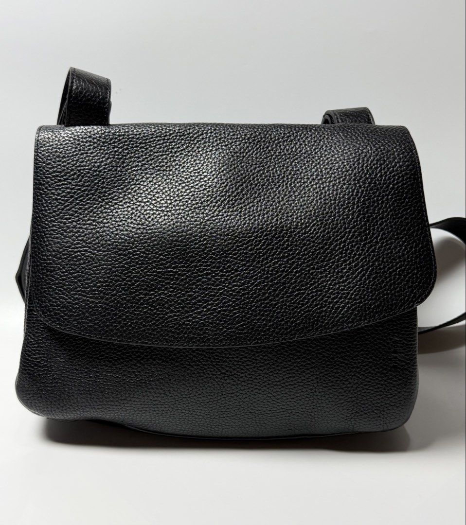 The row - Leather mail crossbody bag (Category: Cross-body Bags) located in Tarlac. Submitted by random.stufff (Listing ID 1437288732, Image 1). Description: The row leather mail crossbody bag Width: 11 inches Height: 10 inches Issue: re-stitched on both sling ends, pls see photos to appreciate. ₱5,000 free shipping Tarlac area .