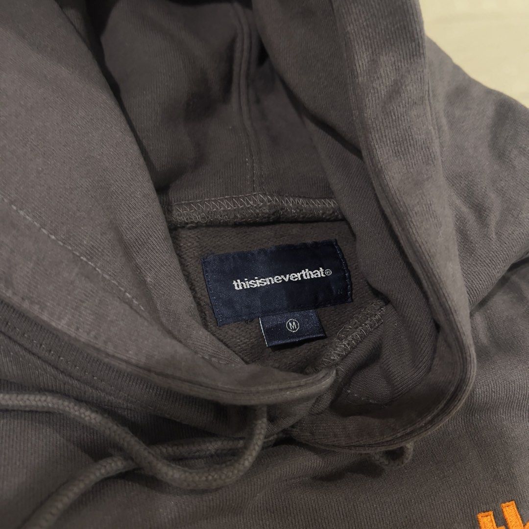 thisisneverthat Brown Hoodie (Category: Hoodies) located in Paranaque City. Submitted by btslite (Listing ID 1437380940, Image 3). Description: - thisisneverthat brown hoodie - Orange logo on the front - Size: M (22x25) - No issues - Hood with drawstrings - Kangaroo pocket ⚠️ Condition: Pre-loved / second-hand. Not brand new—may have minimal signs of use. 📍 Location: Parañaque City (near SM Bicutan) 💳 Payment: GCash / Bank Transfer/BPI/BDO 🚚 S