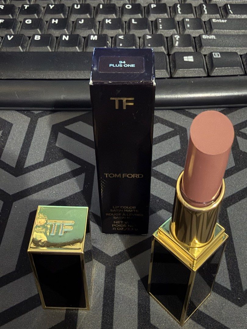 Tom Ford Lip Color Satin Matte - 94 Plus One (Category: Makeup) located in Manila. Submitted by aluxer (Listing ID 1437301315, Image 2). Description: - Tom Ford Lip Color Satin Matte in shade 94 Plus One - Color: Muted Rose - Finish: Satin Matte - Packaging: Original - Features: Black packaging with gold accents - Net Weight:.11 oz / 3.3g Bought from Rustan's Priced at P3,800 in the mall.