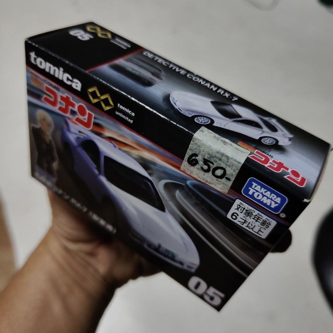 Tomica Premium RX7Detective Conan RX-7 (Category: Vehicle & Diecast Models) located in Manila. Submitted by rossinicalabig (Listing ID 1437311508, Image 2). Description: 650 Pesos. Brand New! Loc: Sta. Mesa Mla Tomica diecast car featuring Detective Conan Mazda RX-7. The box shows the car in white with the character. It is a Tomica Unlimited model. The box has a price tag of 650. .