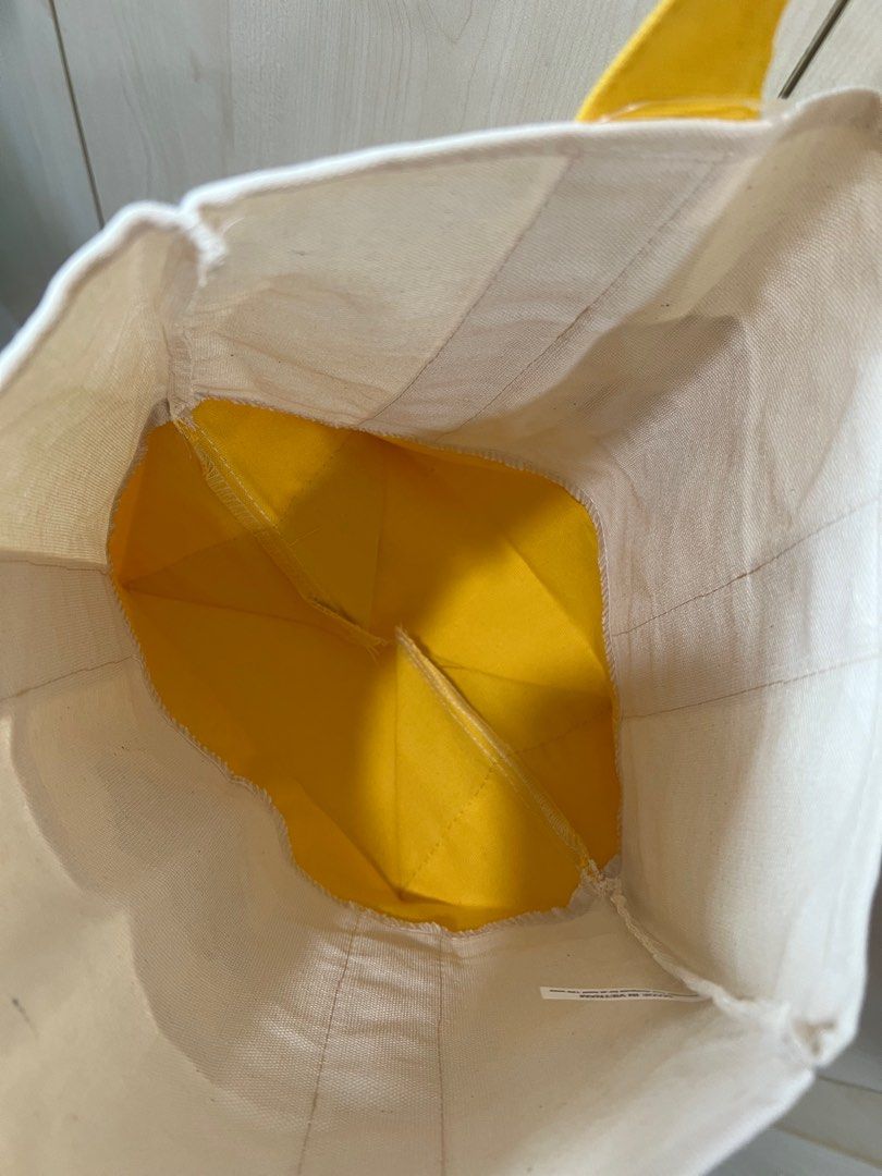 Trader Joes Small Tote (Category: Tote Bags) located in Quezon City. Submitted by ex-box (Listing ID 1437263771, Image 3). Description: Trader Joes Small tote Color: yellow Dimensions: 13.25" x 10.5" x 5.5".