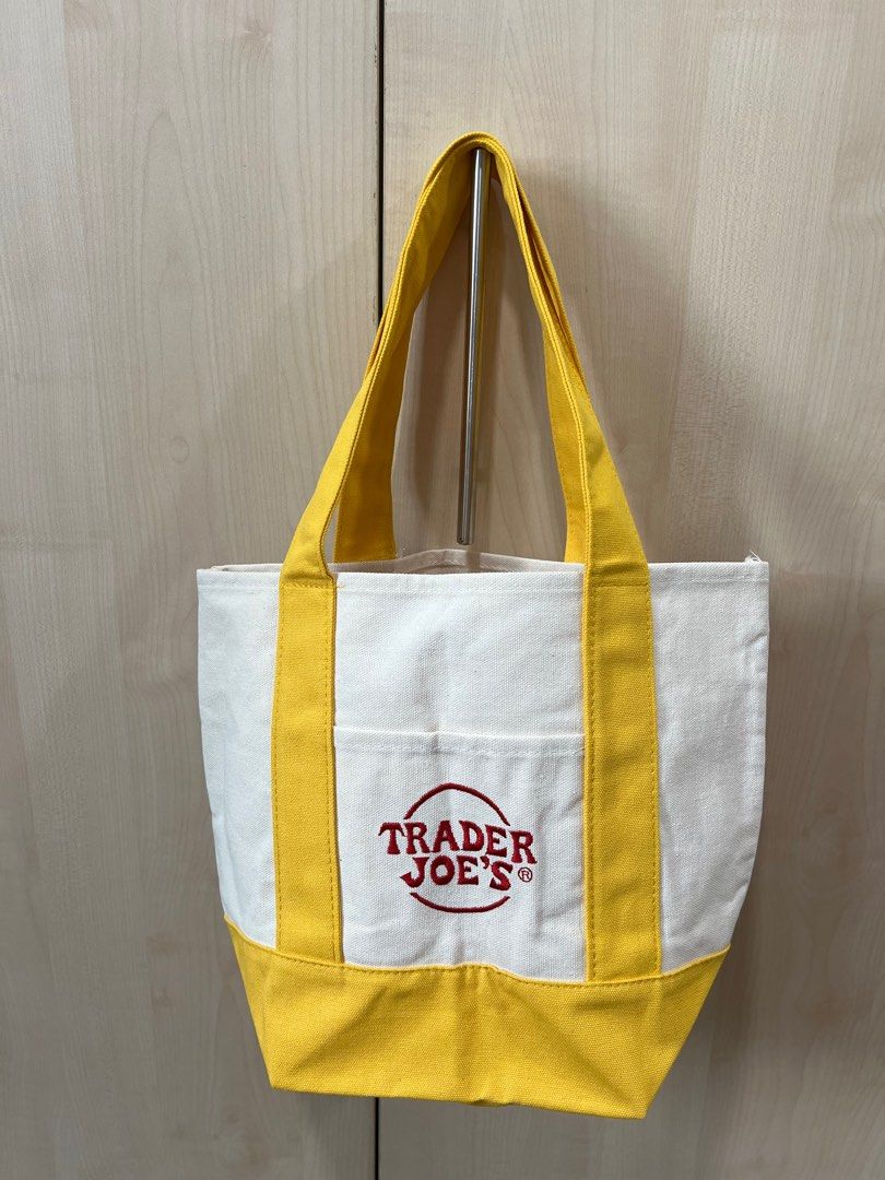 Trader Joes Small Tote (Category: Tote Bags) located in Quezon City. Submitted by ex-box (Listing ID 1437263771, Image 2). Description: Trader Joes Small tote Color: yellow Dimensions: 13.25" x 10.5" x 5.5".
