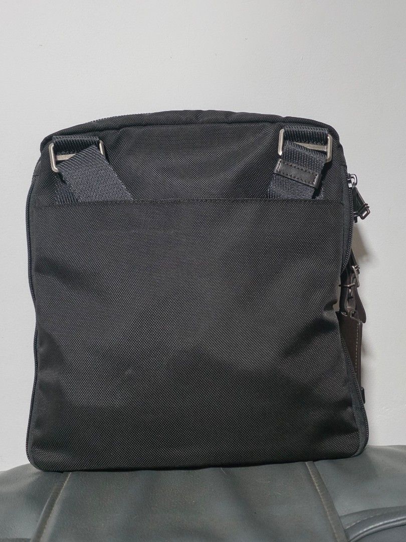 Tumi Shoulder Bag (Category: Luxury Bags & Wallets) located in Cabuyao City. Submitted by swiftdeer.ed9787 (Listing ID 1437319989, Image 2). Description: For sale price: 7k Location: Cabuyao Laguna This is Authentic 100% slightly used no issue - Black Tumi shoulder bag - Front flap with buckle closure - Zippered compartment - Leather tag with Tumi logo - Adjustable shoulder strap - Back pocket - Interior tag with Tumi logo and serial number.