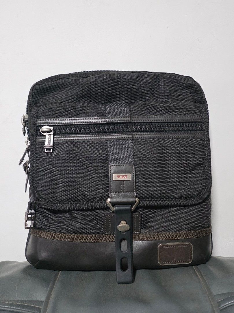 Tumi Shoulder Bag (Category: Luxury Bags & Wallets) located in Cabuyao City. Submitted by swiftdeer.ed9787 (Listing ID 1437319989, Image 1). Description: For sale price: 7k Location: Cabuyao Laguna This is Authentic 100% slightly used no issue - Black Tumi shoulder bag - Front flap with buckle closure - Zippered compartment - Leather tag with Tumi logo - Adjustable shoulder strap - Back pocket - Interior tag with Tumi logo and serial number.