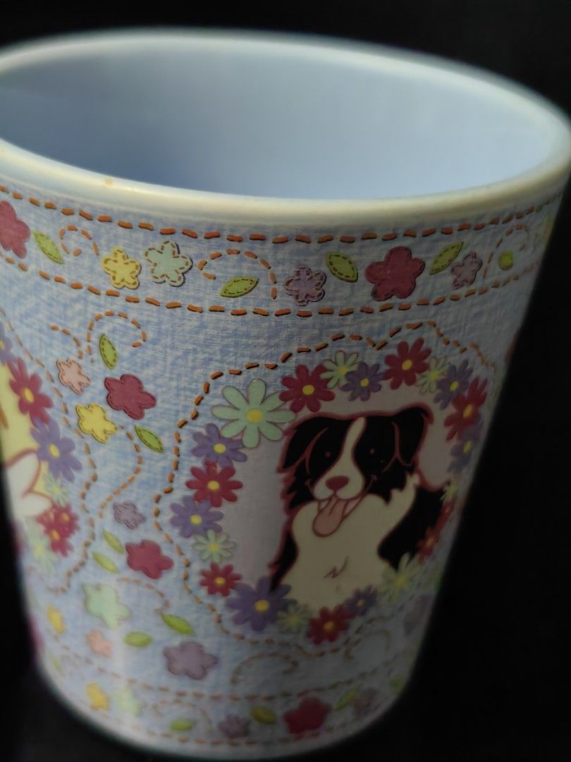 Universal Studios Japan Mug (Category: Coffee & Tea Tableware) located in Rizal. Submitted by gkstcenit (Listing ID 1437297349, Image 3). Description: - Universal Studios Japan mug - Features cute animal designs (pig, duck, dog) and floral patterns - Light blue interior and handle - Approximately 10cm tall.
