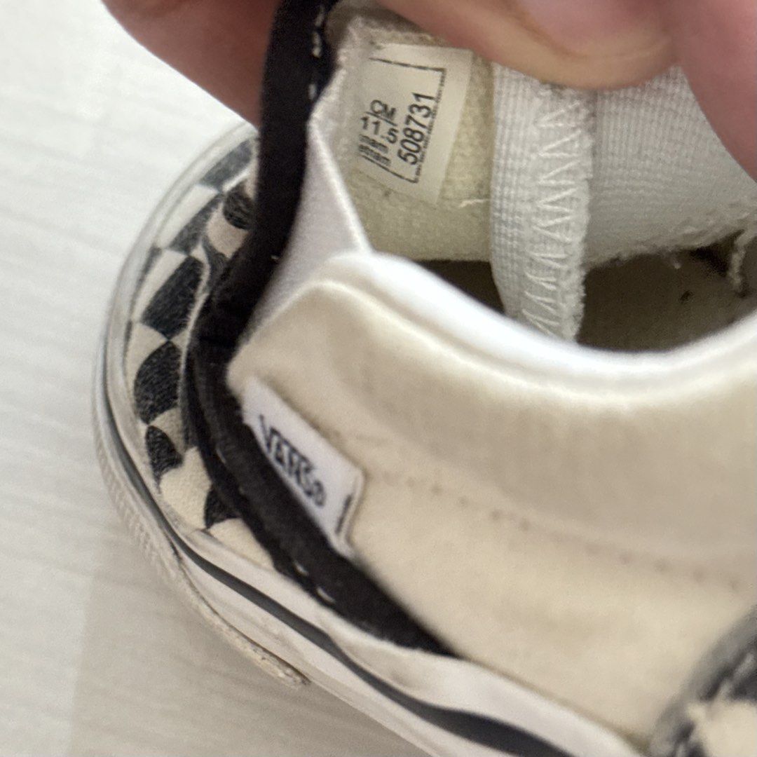 Vans Checkerboard Slip-On Shoes (Category: Babies & Kids Fashion) located in Cavite. Submitted by gccwardrobe (Listing ID 1437277503, Image 2). Description: - Vans Kids Slip-On Shoes - Classic Checkerboard Pattern - Black and White Colorway - White Sole - Size: 11.5 CM - Features Vans logo - Designed for Kids.